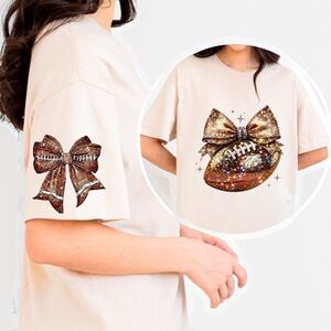 🏈 Sparkle & Spike: Gold Glitter Football Bow t-shirt. Touch down game ready